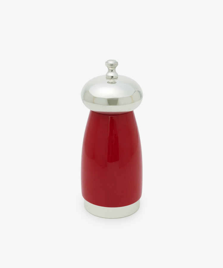 The Giorgio Pepper Mill, with its red and silver finish, rounded top, and metallic accents, showcases Italian design flair against a plain white background.