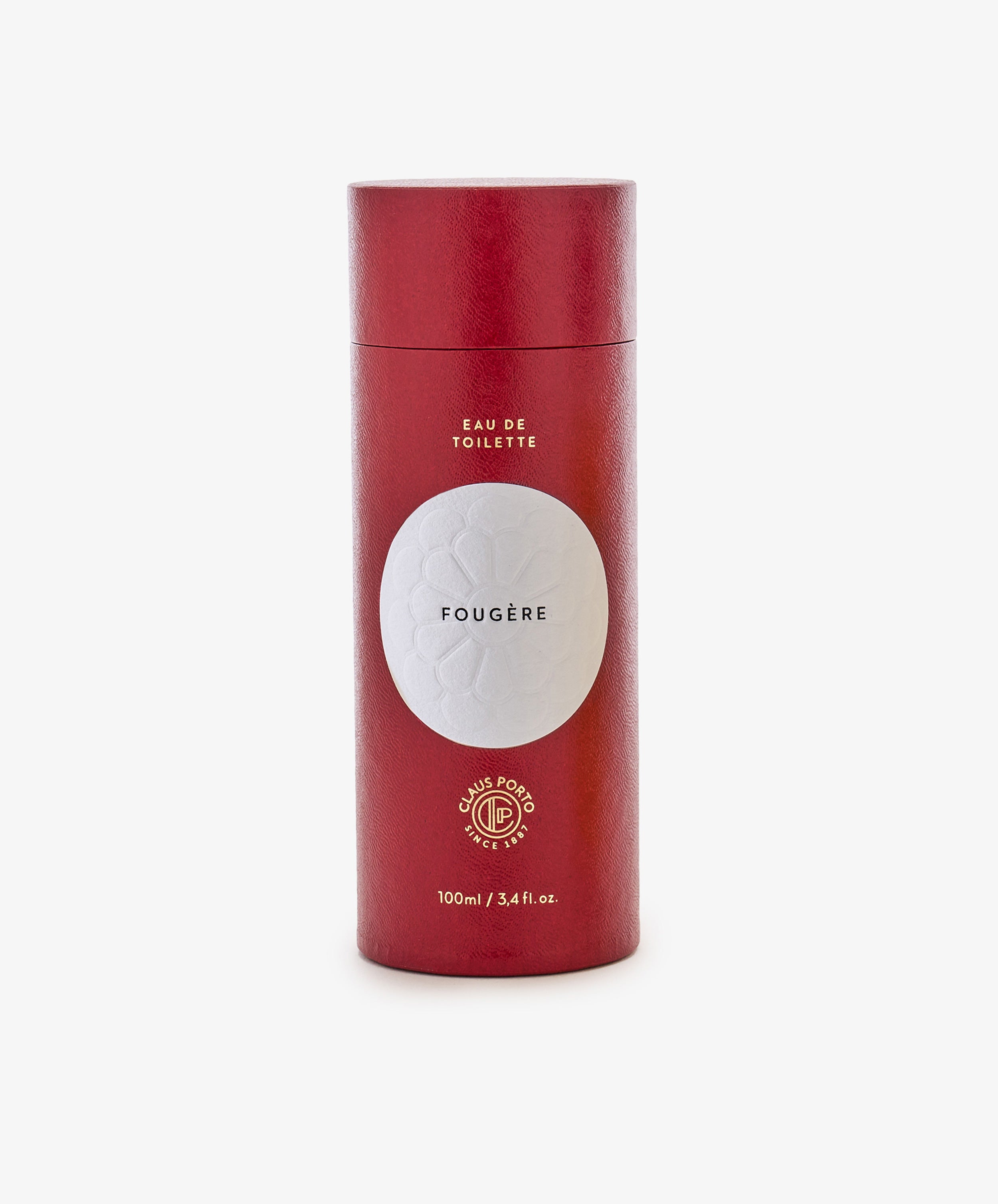 A red cylindrical container labeled Fougère Eau de Toilette, 100ml, stands upright on a plain white background.