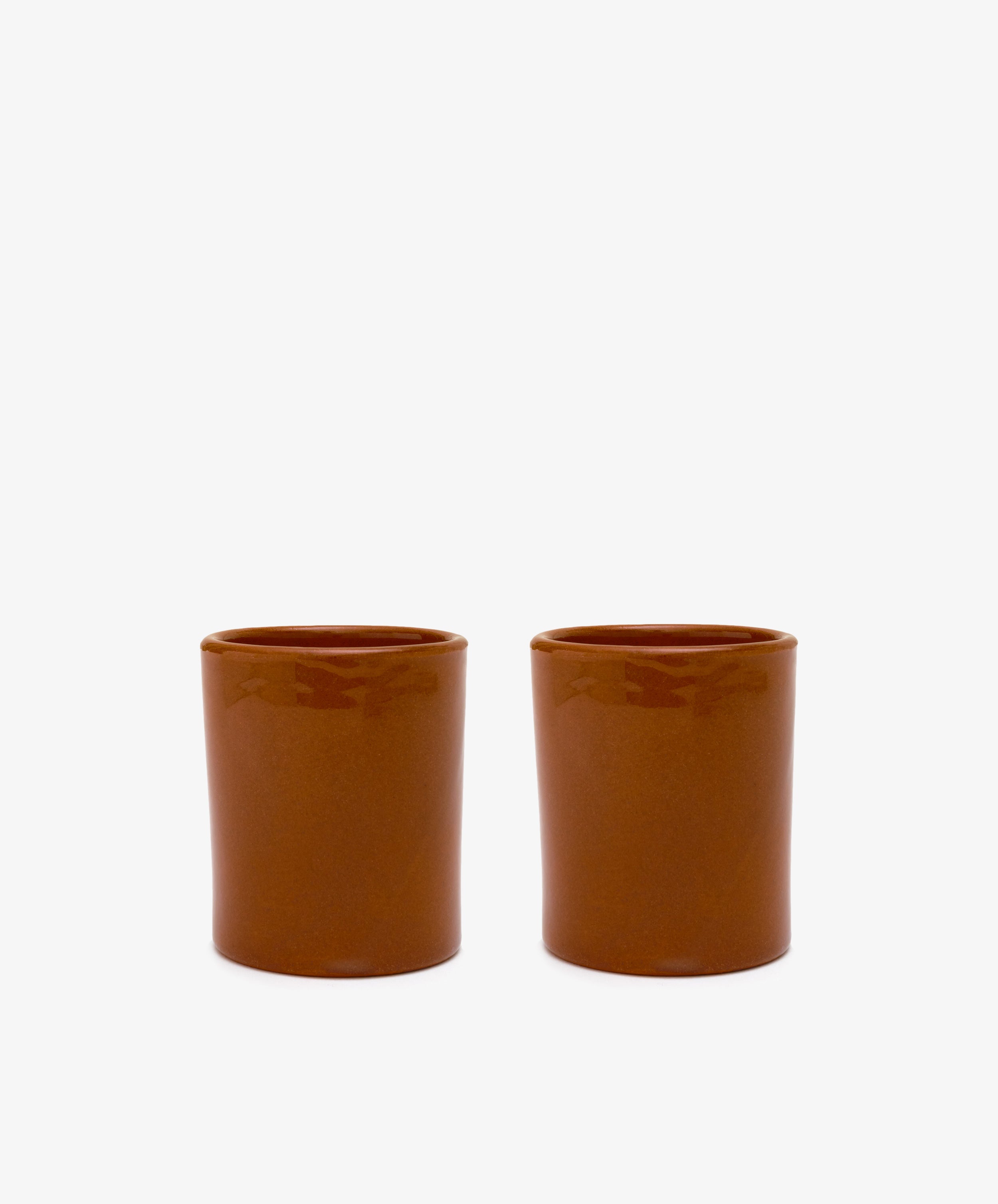 Todia Coffee Cup. Pair of glazed terracotta drinking vessels.