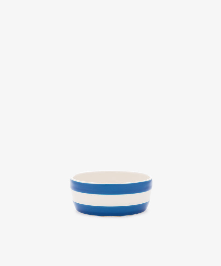 Betty Dip Dish: small white ceramic condiment dish with two bold horizontal blue stripes, shown on a plain white background.