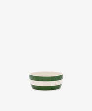The Betty Dip Dish is a small ceramic bowl with green and white stripes, ideal as a striped pottery condiment dish on any table setting.