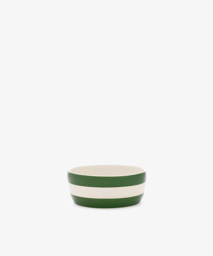The Betty Dip Dish is a small ceramic bowl with green and white stripes, ideal as a striped pottery condiment dish on any table setting.