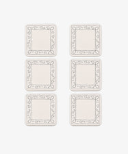The Capriccio Coaster Set of 6 features square coasters with simple black line art borders of leaves and shapes, arranged in two columns and three rows on a white background—ideal for adding a playful touch to your home decor.