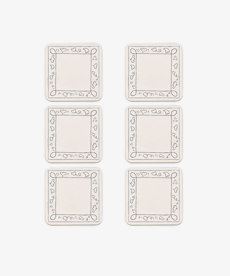 The Capriccio Coaster Set of 6 features square coasters with simple black line art borders of leaves and shapes, arranged in two columns and three rows on a white background—ideal for adding a playful touch to your home decor.