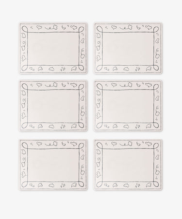 Set of 6 Capriccio Placemats with decorative black loop and leaf borders, arranged in two rows of three on a white background—ideal for stylish table décor from PORTA home.