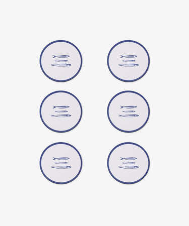 The Costa Coaster Set of 6 features round coasters with blue fish designs, arranged in two columns on a white background to add a chic touch to any table.