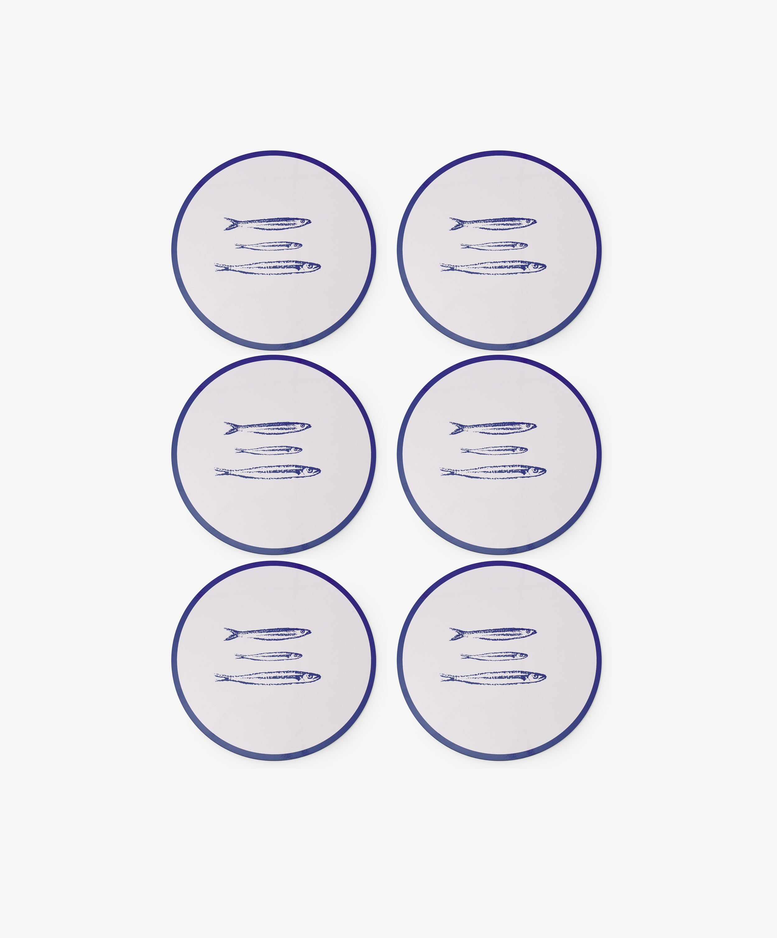 Set of six Costa Placemats featuring white, round designs with blue edges and a trio of fish illustrations—ideal for playful summer table decor or pairing with sardine-themed accents.