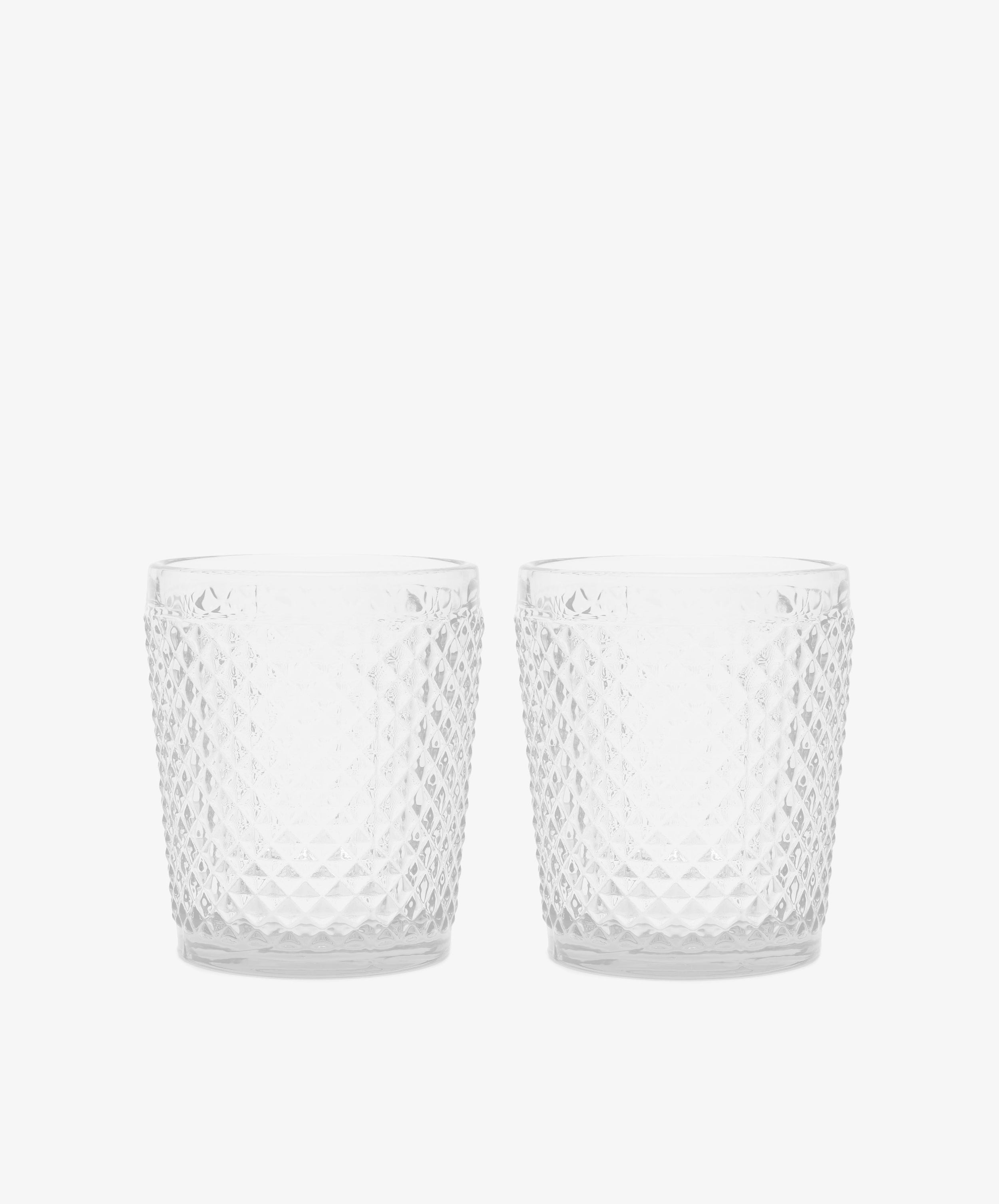 Celeste Water Glass. Two transparent tumbler glasses with diamond cut surface.