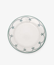 The Arco Dinner Plate, Set of 4 features white ceramic plates with a green dotted and curved border, shown on a plain white background—an elegant choice for contemporary tableware collections.