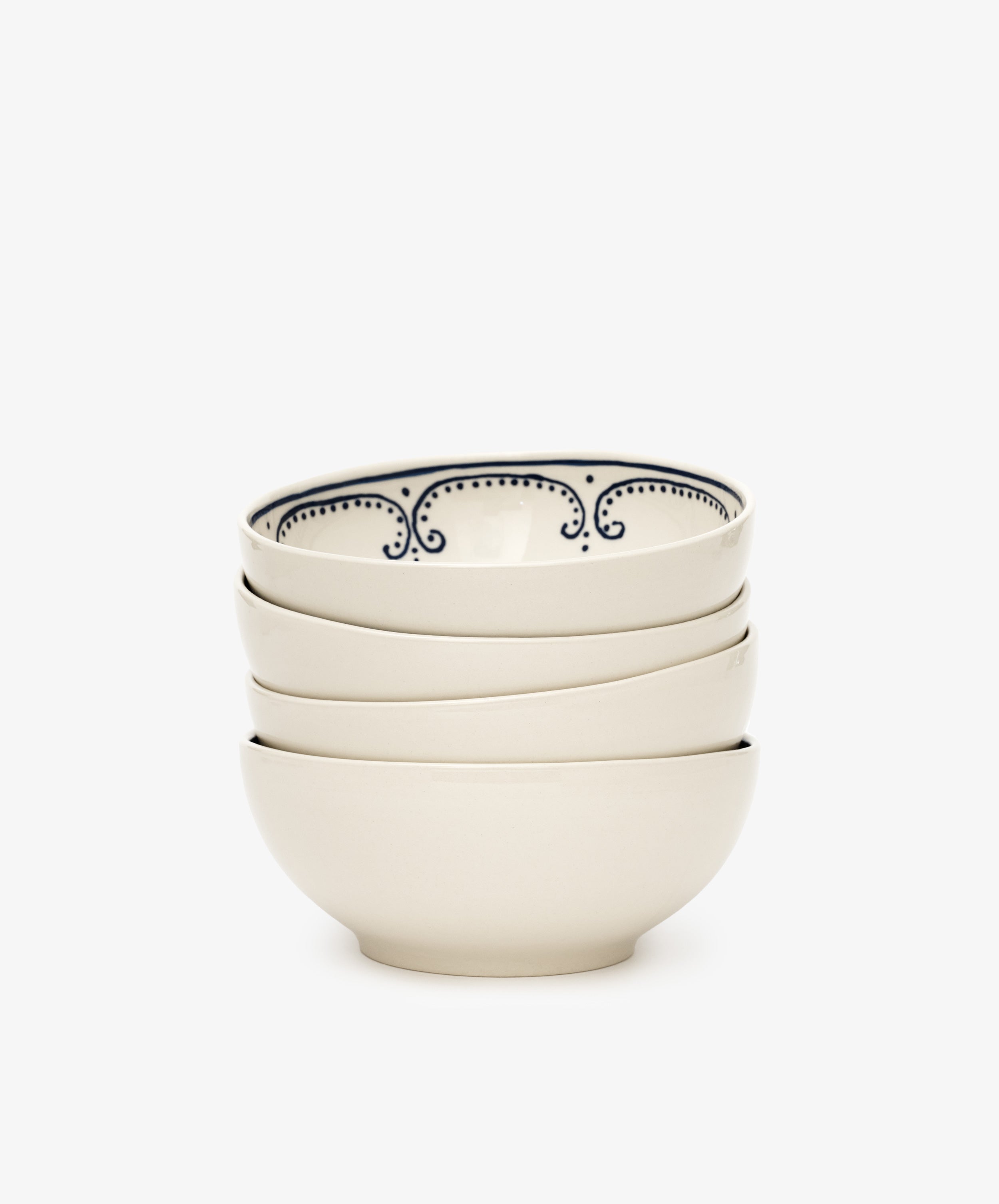 The Arco Cereal Bowl, Set of 4, features four white ceramic Portuguese bowls with a subtle blue inner rim design, ideal for anyone seeking contemporary yet charming tableware.