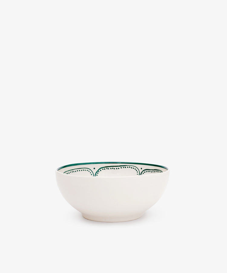The Arco Cereal Bowl, Set of 4, features handmade white ceramic bowls with a green pattern along the inner rim, inspired by traditional Portuguese design and displayed on a plain white background.