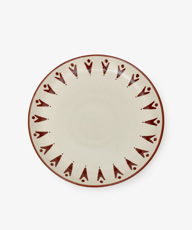 The Vito Dinner Plate, Set of 4 features round ceramic plates from the Vito collection with a cream-colored base and brown geometric border. Handmade for everyday use, these plates offer a stylish and durable option for your table.