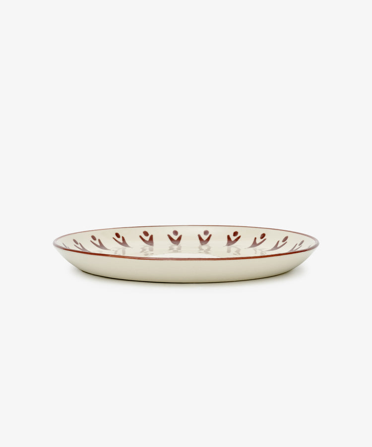 The Vito Dinner Plate, Set of 4, features round ceramic plates with a cream base, brown rim, and handmade leaf-like edge pattern—ideal for everyday use. Shown against a white background.