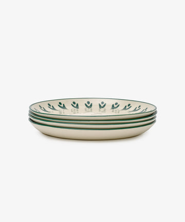 The Vito Dinner Plate, Set of 4, features white ceramic plates with a green patterned rim—ideal for daily use. Displayed on a plain white background.