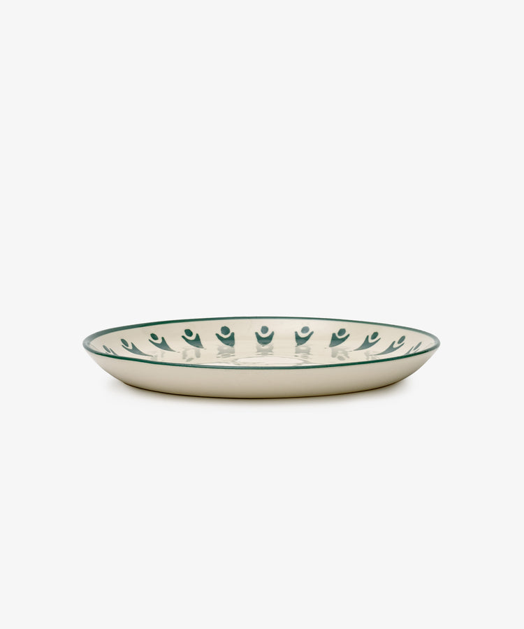 The Vito Dinner Plate, Set of 4, features shallow round ceramic plates with a cream base and green rim pattern—ideal for daily use and beautifully displayed on a white background.