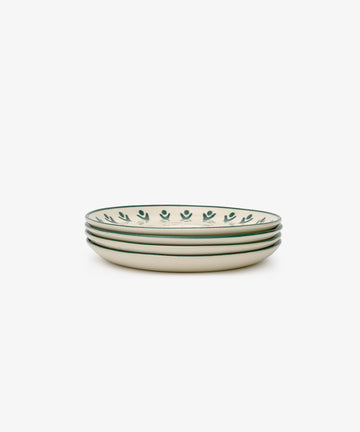 The Vito Small Plate, Set of 4, features cream-colored ceramic plates with a green leaf rim pattern—ideal for everyday use—displayed on a plain white background.