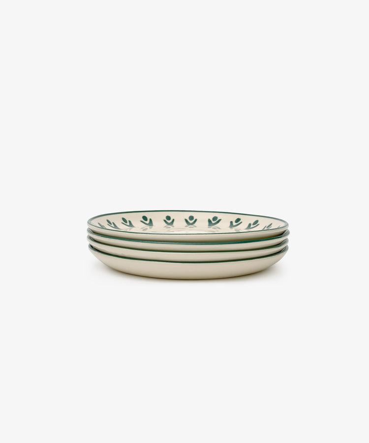 The Vito Small Plate, Set of 4, features cream-colored ceramic plates with a green leaf rim pattern—ideal for everyday use—displayed on a plain white background.