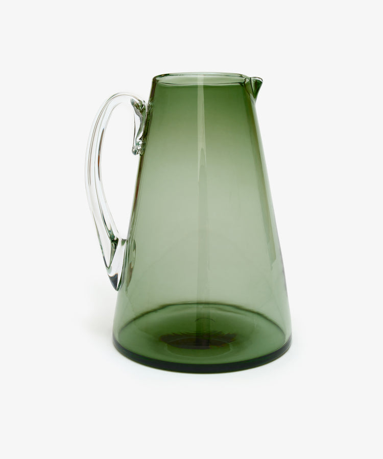 Gemma Jug. Transparent smoke-green hand-blown glass jug with clear handle, alt side view.