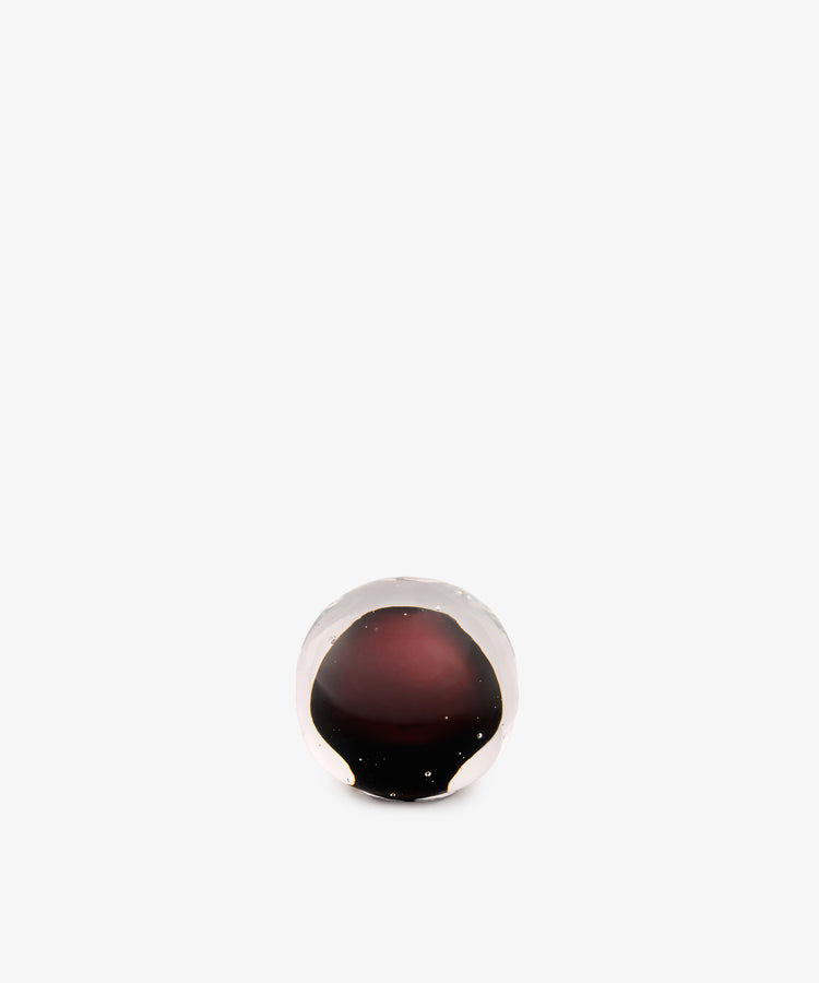 Pallino Paperweight: a hand-blown, spherical glass paperweight with a deep black cherry red core.