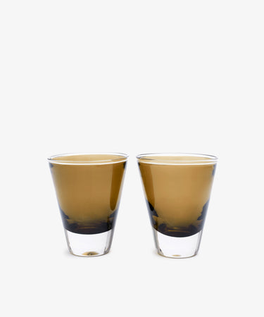 A set of two Gem Glasses, expertly hand blown in a conical shape, are placed side by side on a plain white background.
