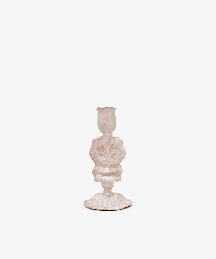 The Jarra De Flores Candleholder is a hand-moulded white ceramic piece with a shell-inspired sculptural form, shown against a plain white background.