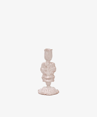 The Jarra De Flores Candleholder features an ornate, vintage-inspired white design with sculptural details, reminiscent of hand-moulded glazed pieces, shown against a plain white background.