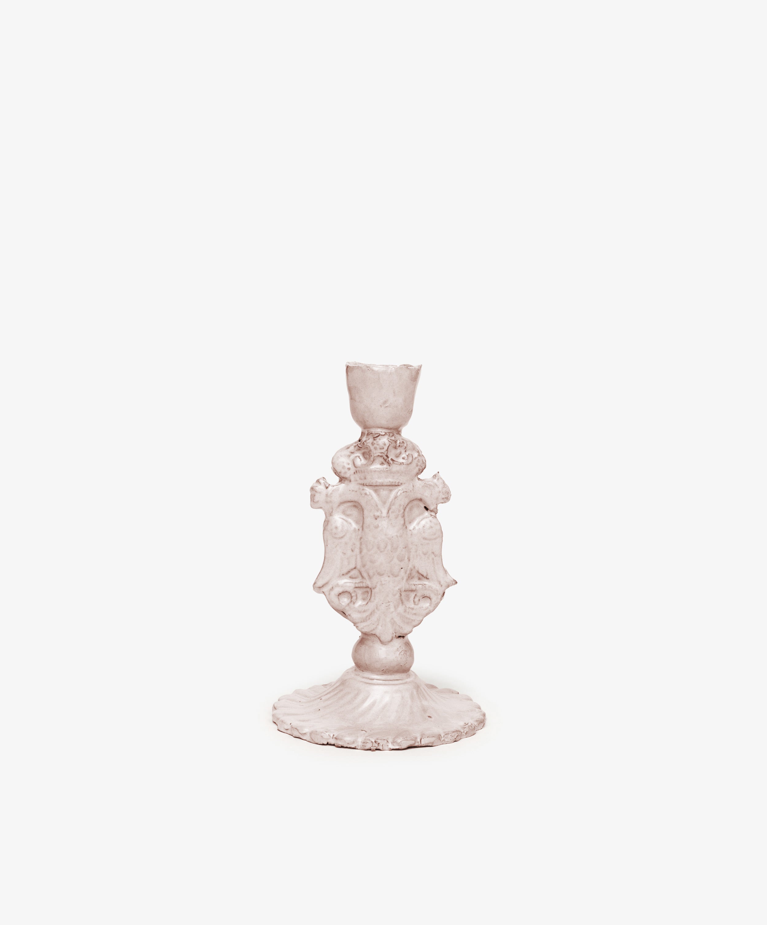 The Aguila Bicefala Candleholder features a sculptural, ornate vintage design with decorative detailing, shown against a plain white background.