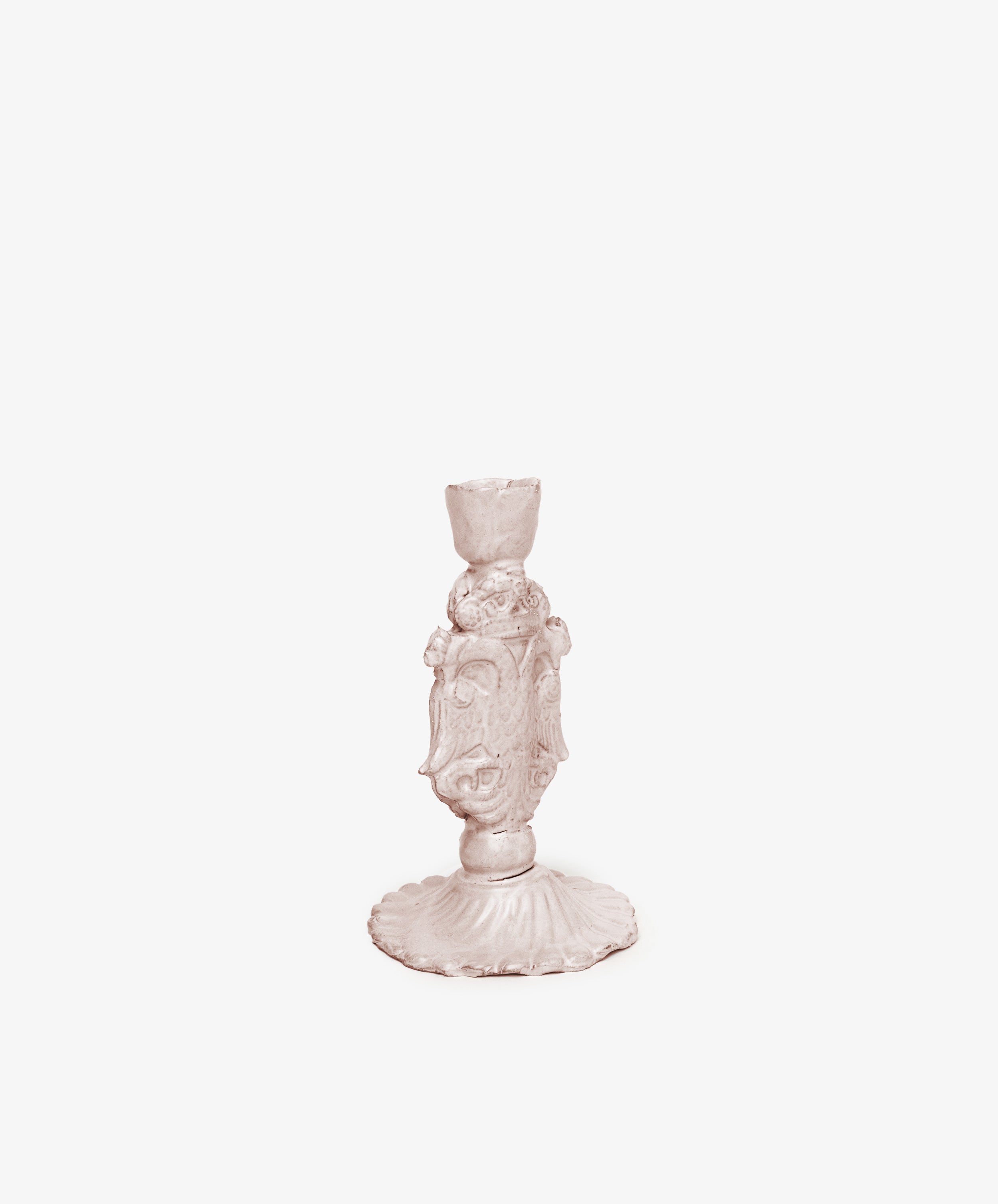 The Aguila Bicefala Candleholder features an ornate, sculptural design with decorative detailing, showcased standing upright against a white background.