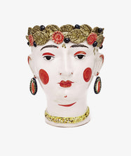 Testa di Moro, Arandano: A ceramic vase inspired by Testa di Moro heads, features a woman’s head with a leafy crown, earrings, and bold facial details—a striking sculptural statement piece for your home décor.