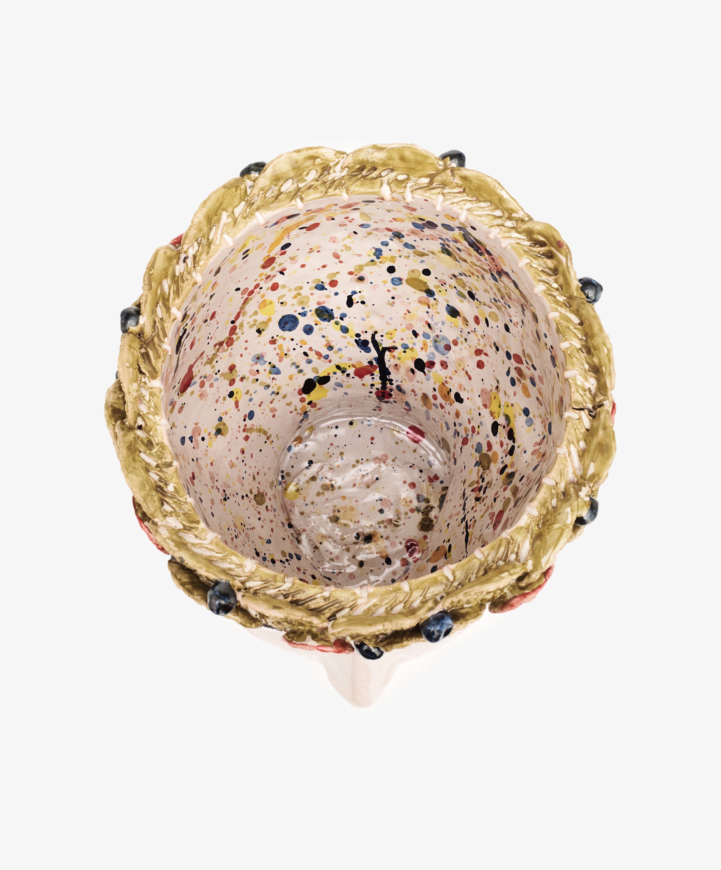 Overhead view of the Testa di Moro, Arandano ceramic cup featuring a textured golden rim and a speckled, multicolored interior—an artistic homeware piece that makes a sculptural statement.