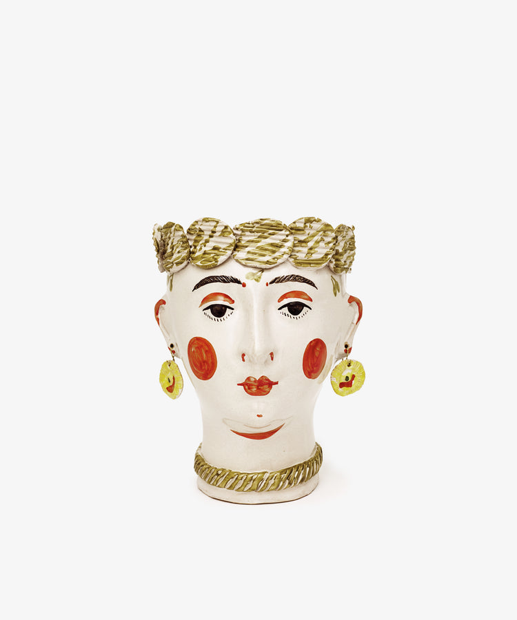 Testa di Moro, Biloba: a ceramic vase inspired by classic Testa di Moro heads, features a sculpted human face with painted details, gold-toned hair accents, earrings, and necklace—a standout piece for unique homeware collections.