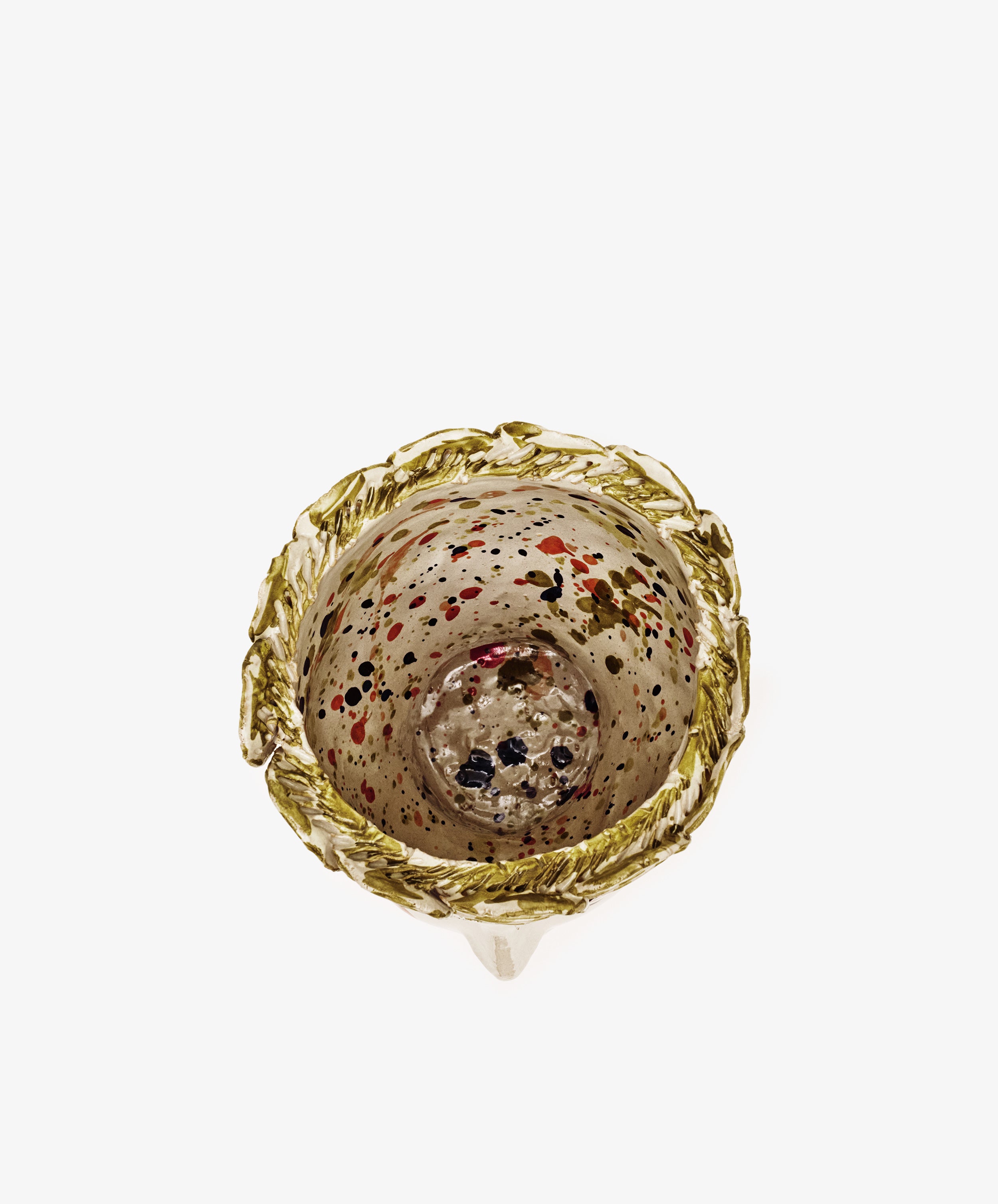 The Testa di Moro, Biloba is a glass cup with a gold-toned rim and multicolored speckles inside—an artistic piece that adds elegance to your homeware collection.