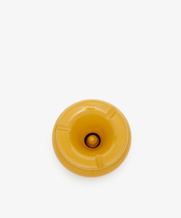 Mix & Match Ashtray by Enza Fasano. Glazed ceramic vessel with matching lid in mustard yellow, top view.