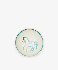 The Folk Cereal Bowl, Horse features a hand-painted blue horse illustration at its center, crafted by an Italian ceramist. Its white background makes it perfect for mixing and matching with your favorite tableware.