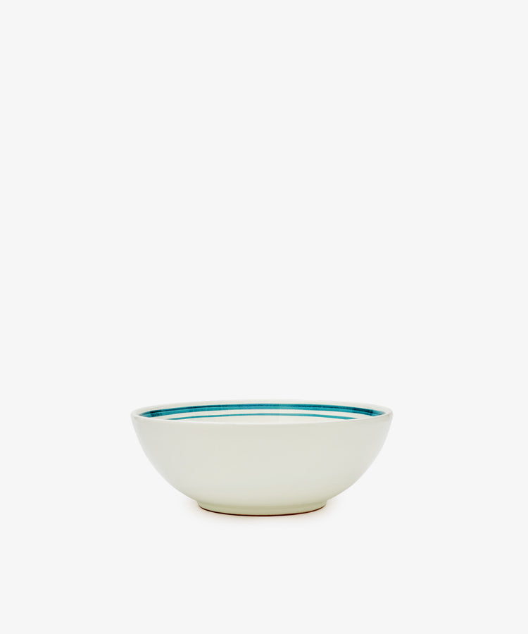 The Folk Cereal Bowl, Horse is a hand-painted Italian ceramic bowl with a white body and blue inner rim, shown on a plain white background. Ideal for mixing and matching with your favorite tableware.