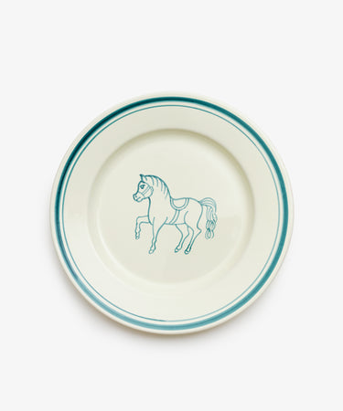 The Folk Dinner Plate, Horse is a white ceramic plate with teal rim accents and a hand-painted teal horse illustration at the center, expertly crafted by an Italian ceramist.