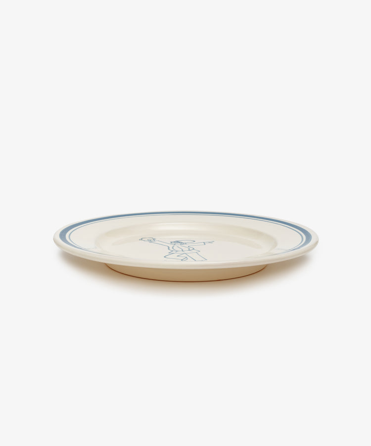 The Folk Dinner Plate, Jester is a hand-painted Italian plate with a thin blue rim and a simple blue line design at the center—perfect for adding elegance to your tableware.