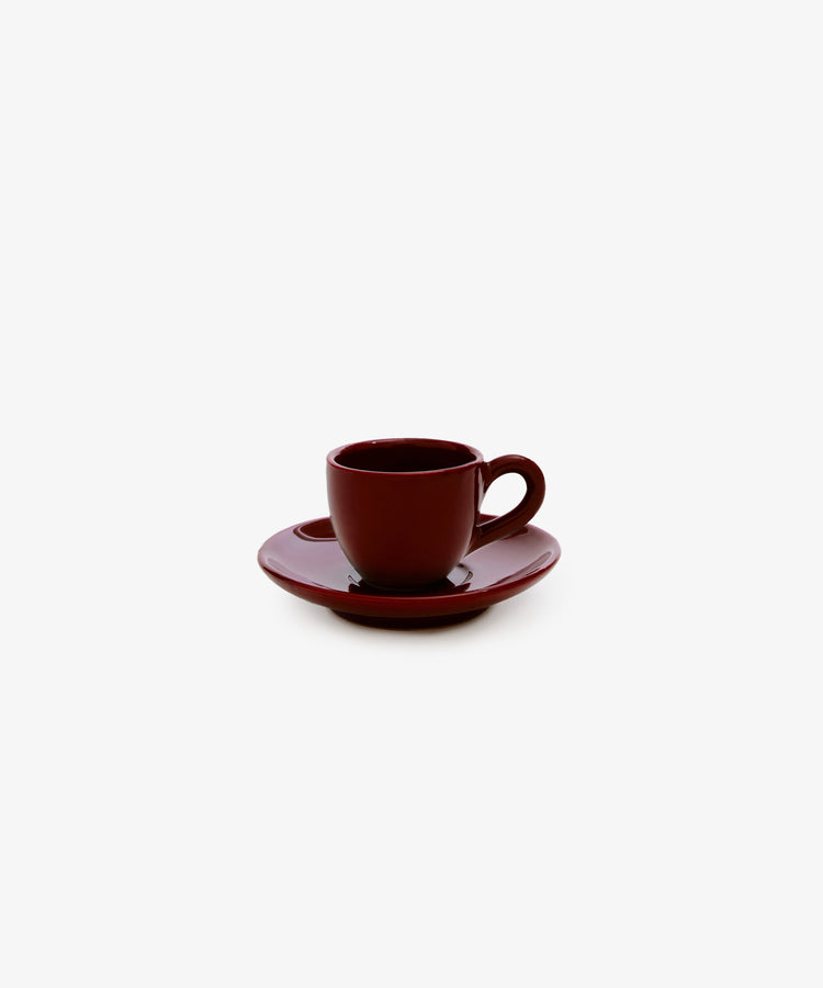 Gio Espresso Set by Enzo Fasano. Burgundy glazed ceramic espresso cup and saucer.