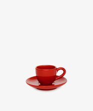 The Gio Espresso Set features a handmade ceramic espresso cup and matching red saucer, presented on a plain white background.