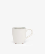 The Guido Mug is a plain white ceramic coffee mug with a handle, shown against a white background.