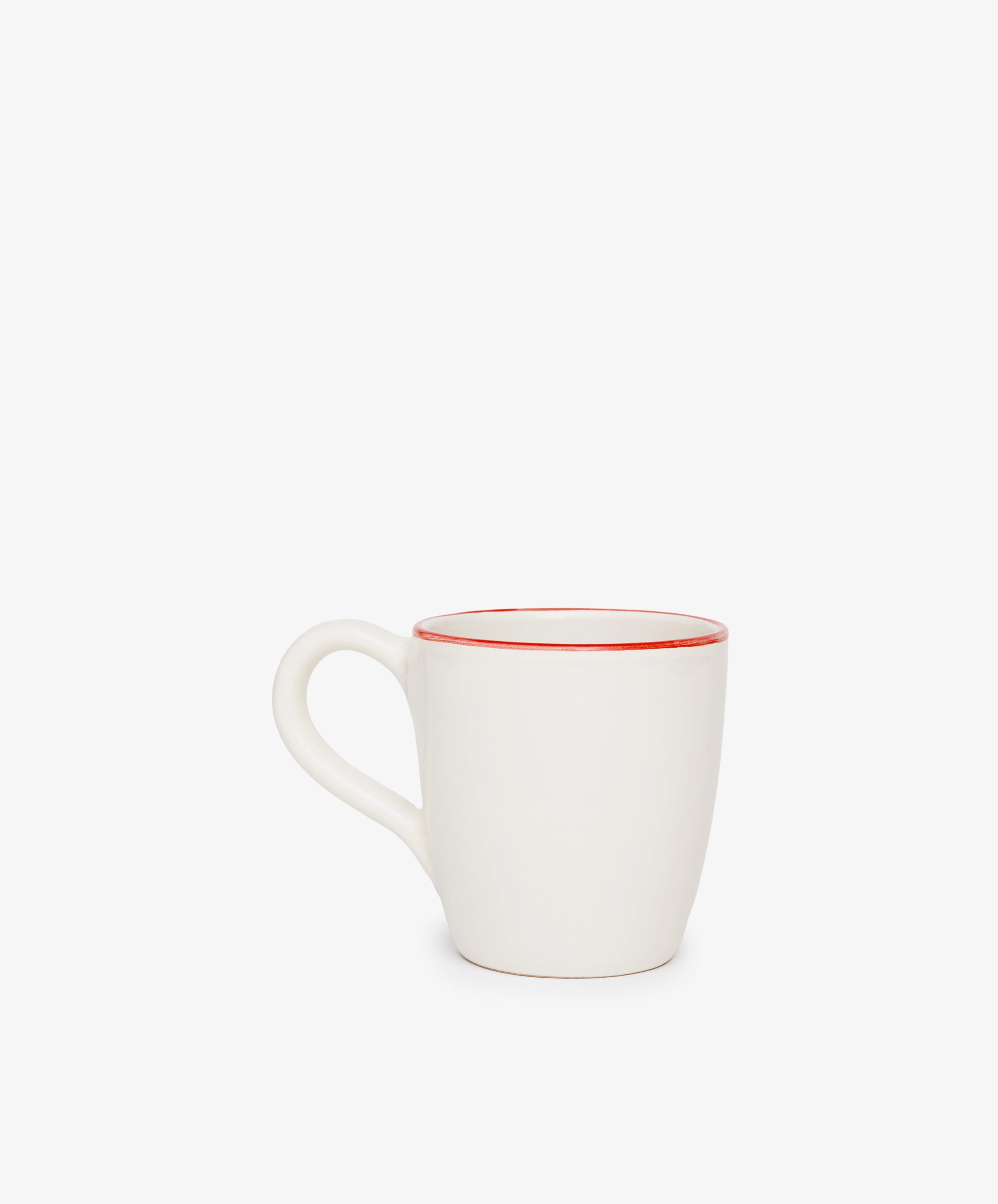 The Guido Mug is a white ceramic breakfast cup featuring a curved handle and a thin red rim, displayed on a plain white background.