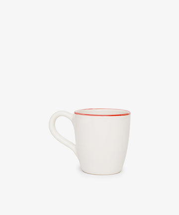 The Guido Mug is a white ceramic breakfast cup featuring a curved handle and a thin red rim, displayed on a plain white background.