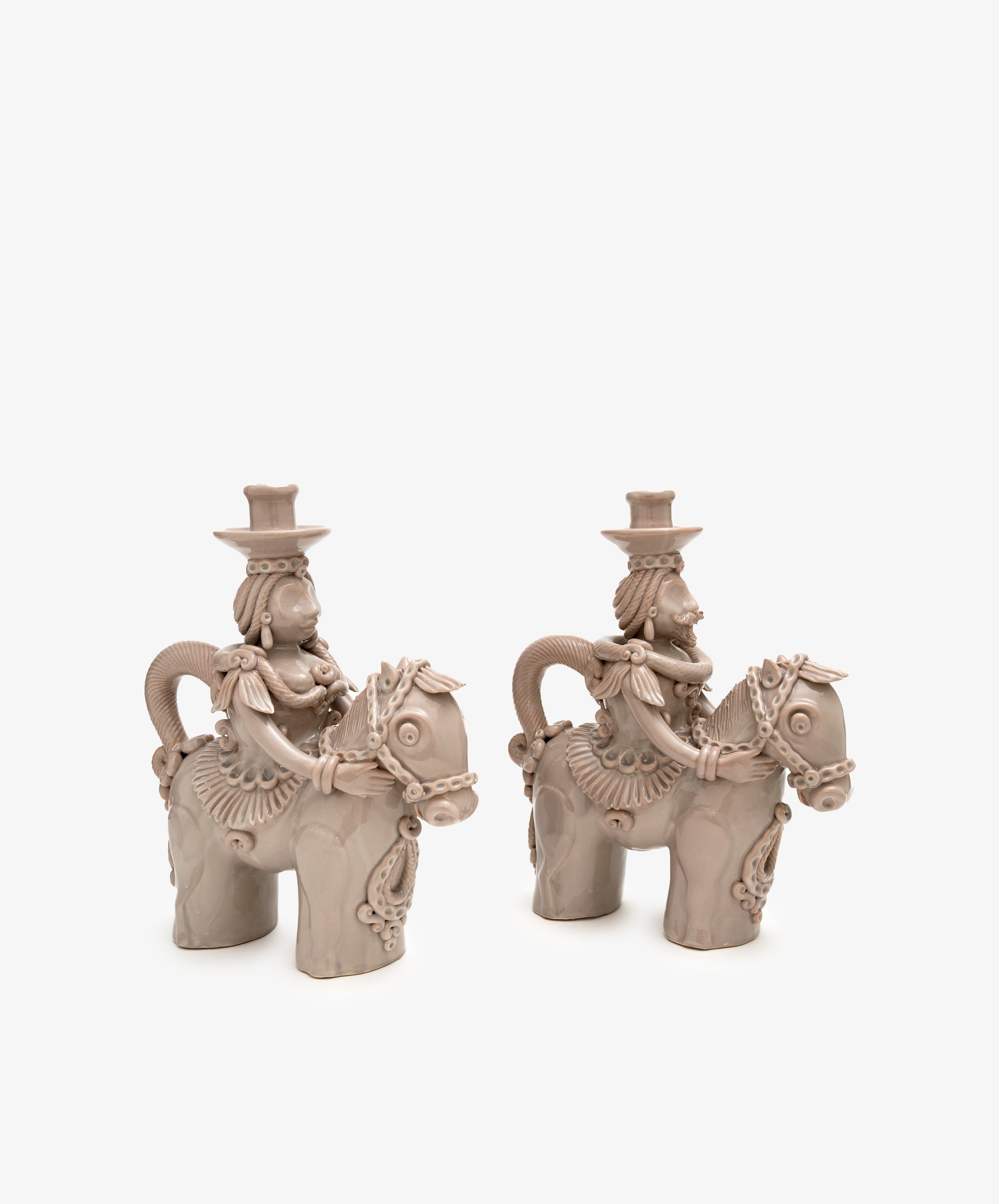 Pair of large Bello and Bella Horseman Candelabras, side view.