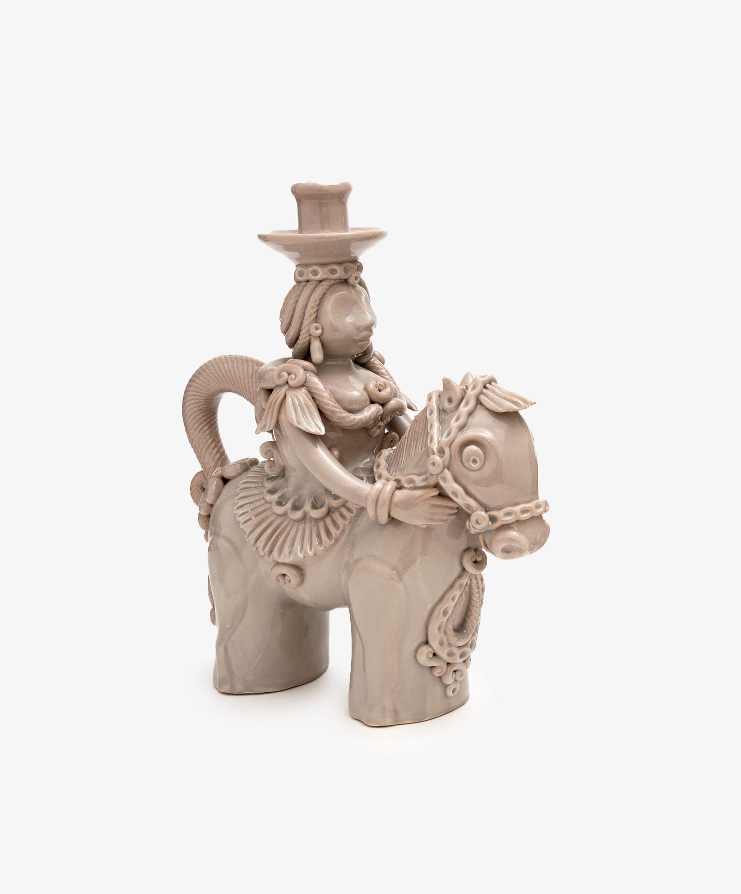 Bella Horseman Candelabra by Enza Fasano. Tan glazed ceramic sculptural candle holder of woman on horse.