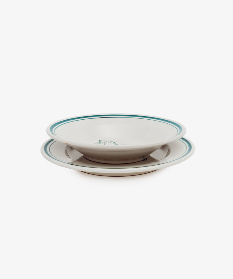 The Folk Pasta Bowl, Horse features two stacked white ceramic bowls with green and blue rim stripes, crafted by an Italian ceramist—an elegant addition to any table setting.
