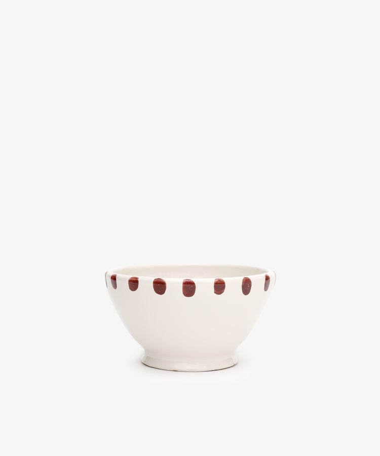 The Nina Bowl, Set of 4, features white ceramic bowls with a plain background and a row of evenly spaced brown dots around the rim.