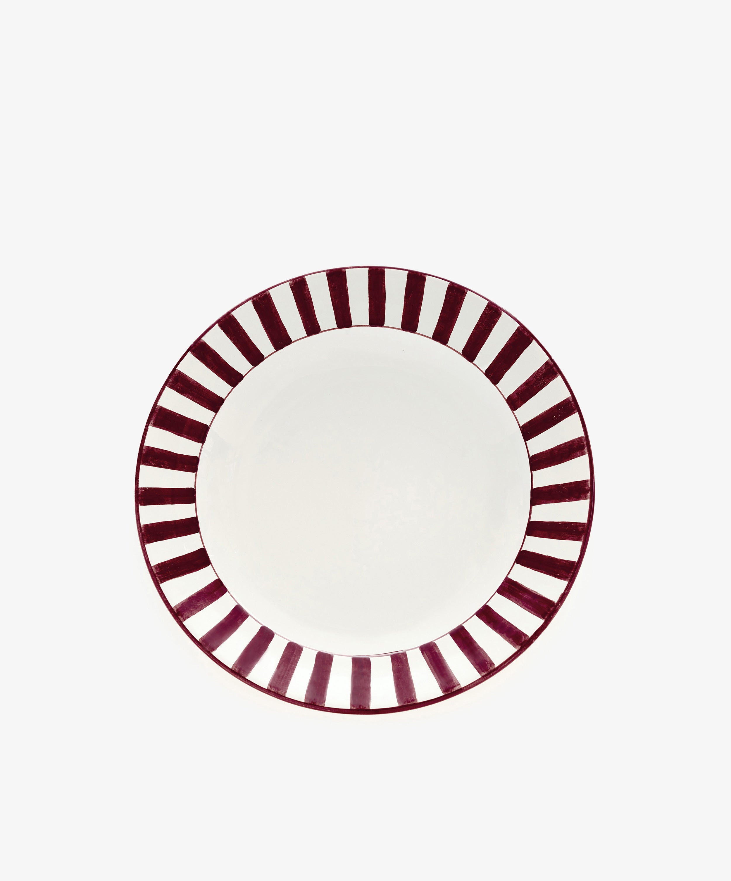 Julius Serving Bowl by Enza Fasano. White ceramic bowl with burgundy stripes border motif.