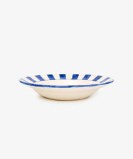 Julius Serving Platter. Ceramic serving platter with painted blue stripe pattern. Side view.