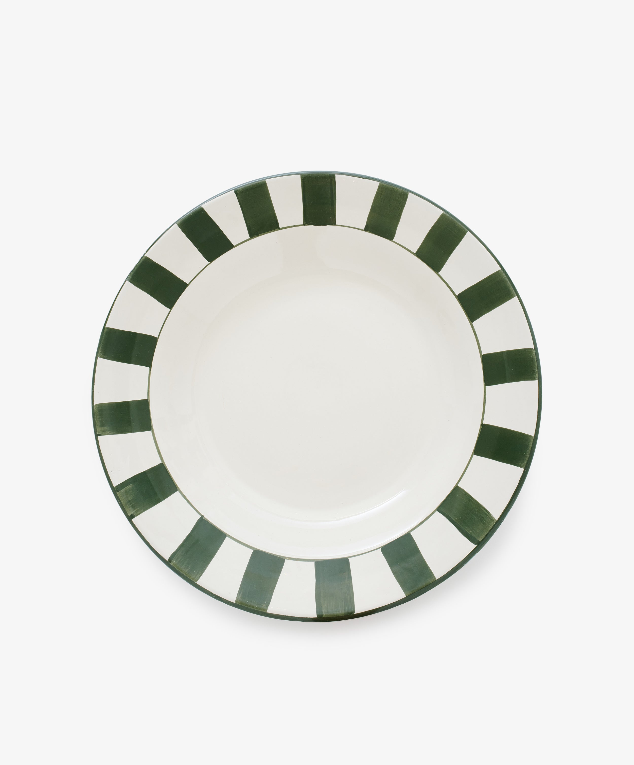 Julius Serving Platter in Green. Green stripes on round white ceramic platter. Top view.