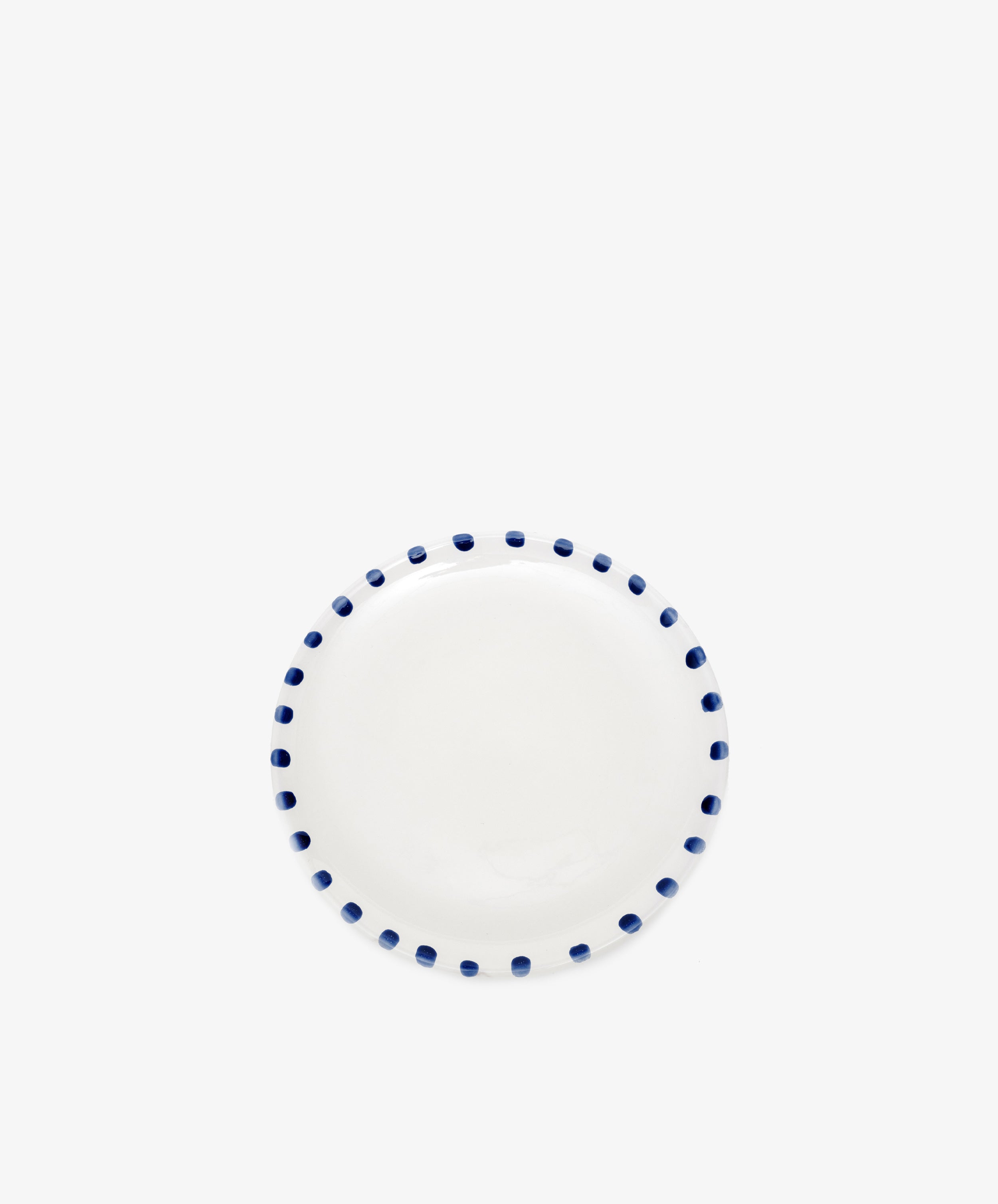 Nina Small Plate by Enza Fasano. White glazed ceramic plate with blue painted rim details.